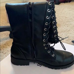 Knee high black combat boots